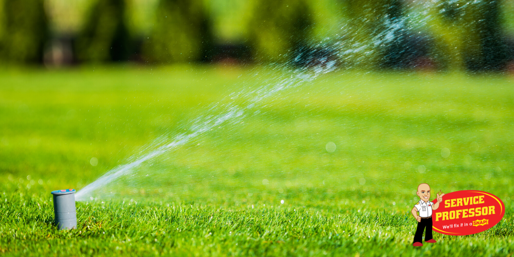 in ground water sprinkler watering lawn