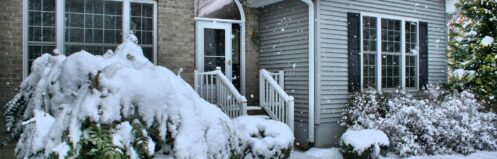 House blanketed in snow