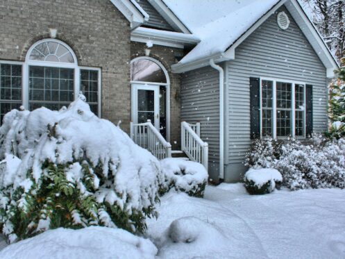 House blanketed in snow